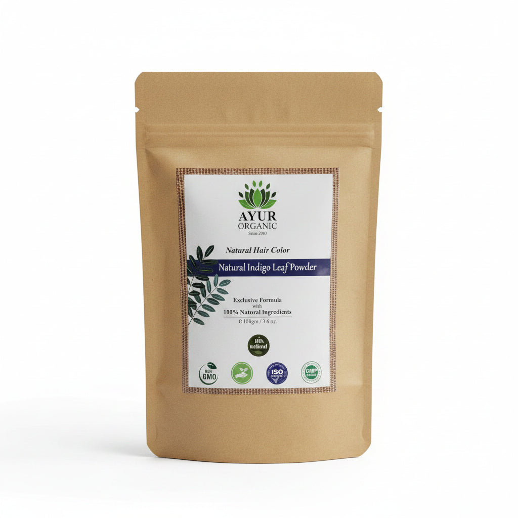Brown package of Ayur Organic Natural Indigo Leaf Powder on a cardboard surface.