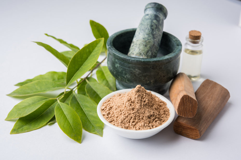 A variety of white and red sandalwood products, including powders, oils, and skincare items, beautifully presented alongside sandalwood logs and shavings, emphasizing their natural purity, aromatic qualities, and versatile benefits for wellness and beauty.