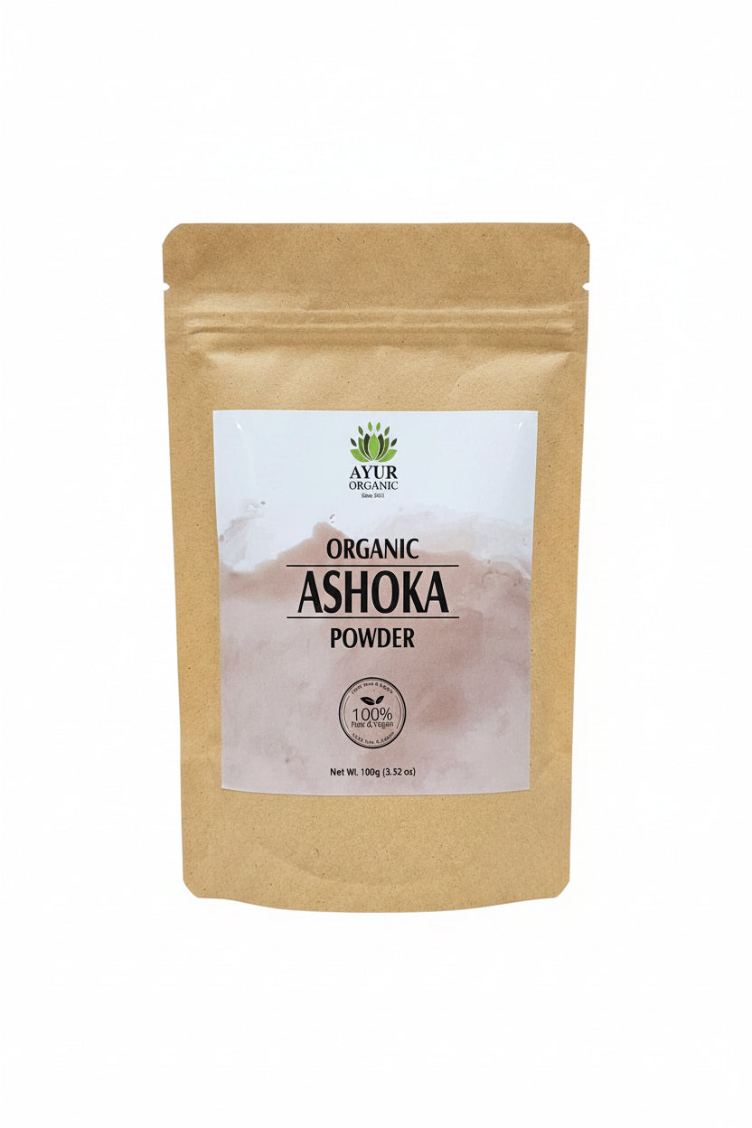 Kraft paper packaging with a white label for Ashoka Organic Powder on a brown surface.