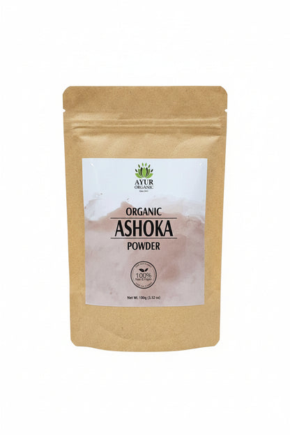 Kraft paper packaging with a white label for Ashoka Organic Powder on a brown surface.