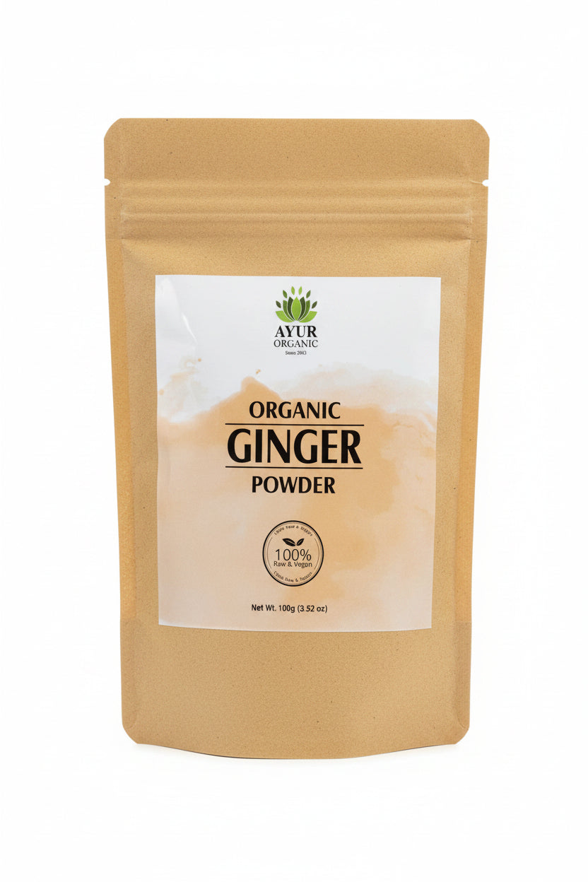 Bag of organic ginger powder with a brand label on a wooden surface
