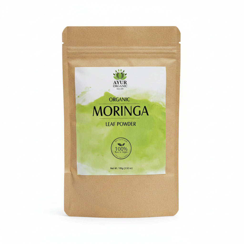 Moringa powder package on a cardboard surface