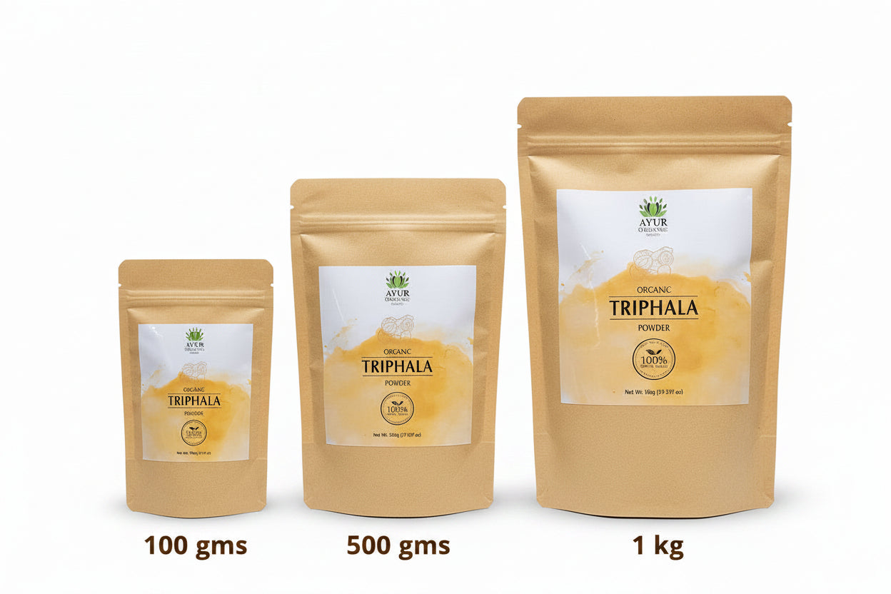 Three packages of Ayur Triphala powder on a shelf.