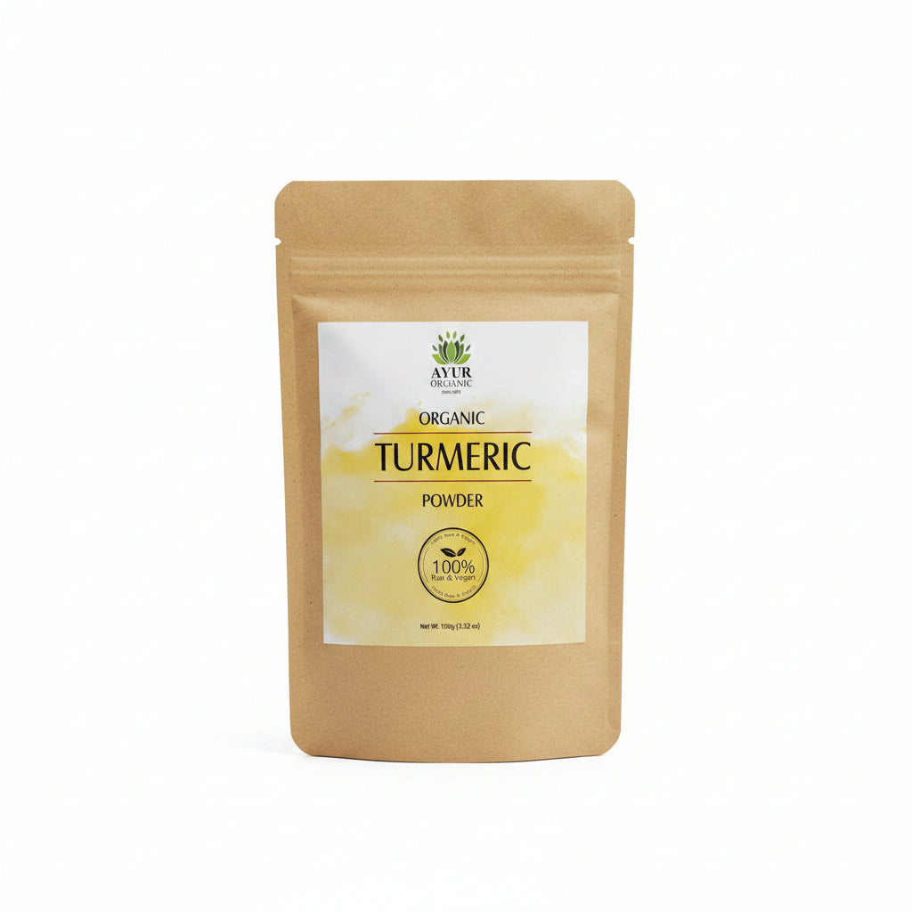 Bag of organic turmeric powder with a brand label on a wooden surface.